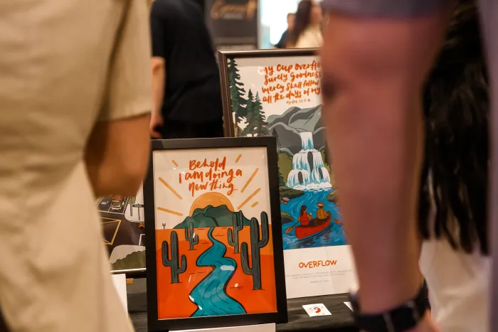 Four One Two scripture art prints at a pop-up market in Singapore — photo 8